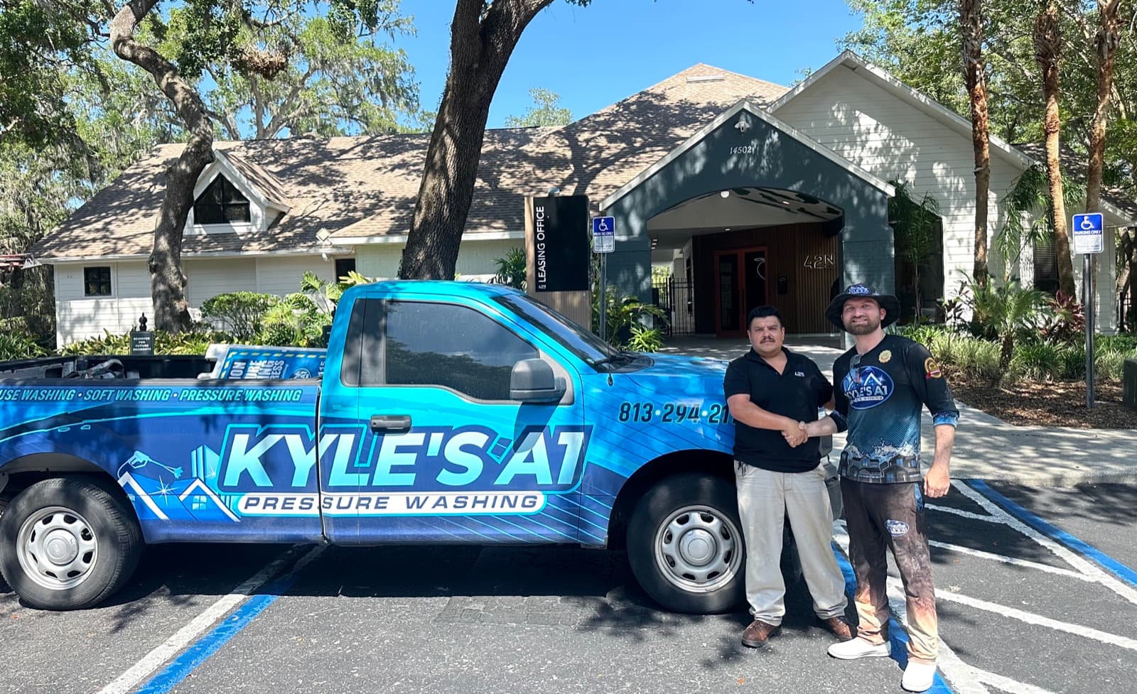 Kyle's A1 Pressure Washing team with satisfied customer