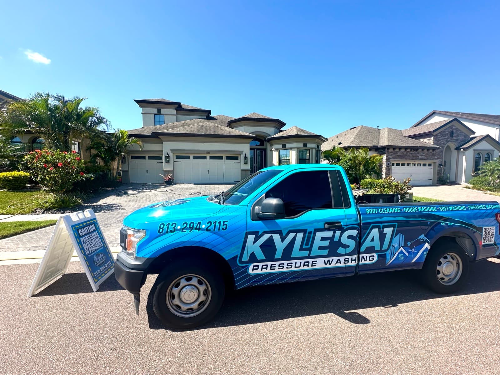 Kyle's A1 Pressure Washing truck at job site in FishHawk